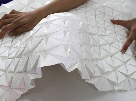 A New Concept for Shape-Shifting Architecture That Responds to Heat | Three architecture students from Barcelona's Institute for Advanced Architecture came up with a new concept for shape-shifting architecture that responds to heat.  Ece Tankal, Efilena Baseta, Ramin Shambayati  | WIRED.com Kinetic Architecture, Folding Architecture, Folding Structure, Origami Architecture, Henning Larsen, Origami Ball, Paper Architecture, Origami Models, Origami Fashion