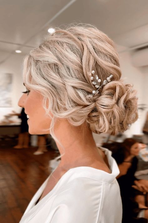 wedding updo, elegant hairstyles, timeless wedding Wedding Hairstyles Updo Elegant Classy, Low Romantic Updo Brides, Bridal Style Updo, Bridal Romantic Updo, Wedding Low Bun With Veil, Boho Bridal Updo With Veil, Wedding Bride Hairstyles Updo, Wedding Updo Front View, Blonde Updo Wedding