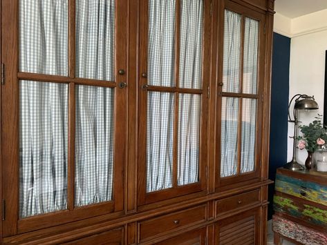 DIY Glass Cabinet Fabric Panels Fabric Inside Glass Cabinets, Fabric Lined Cabinets, Cabinet With Fabric Doors, Glass Cabinet Privacy, Kitchen Cabinets With Fabric Doors, Cabinet Fabric Door, Glass Cabinet Curtains, Curtains Inside Glass Cabinet, Fabric Cabinet Door Curtains