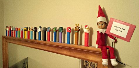 Playing 'Follow the Leader' with PEZ dispensers! Elf On The Shelf With Pez Dispenser, Elf Fun, Pez Dispensers, A Shelf, On The Shelf, The Elf, Christmas Elf, Elf On The Shelf, Elf