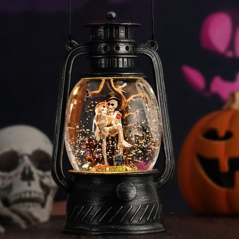 PRICES MAY VARY. Halloween Decorations : HOLYHOM Snow Globe feature a hand painted Wedding Skeleton Couple & Love Never Dies Scene, made from durable resin materials. Prefer for Halloween Home Decorations and Gifts. Light-Up Snow Globe : Light up glitter globe casting a ghostly glow on Wedding Skeleton Couple, Romantic Skeletons Figurine perfect for Halloween, Day of The Dead. 6-Hour Timer & Battery : Conveniently equipped with a 6-hour timer, work for 6 hours and off for 18 hours, cycle every 2 Snow Globe Halloween, Halloween Home Decorations, Halloween Wedding Gifts, Globe Lantern, Halloween Lantern, Glitter Halloween, Glitter Globes, Skeleton Couple, Halloween Lanterns