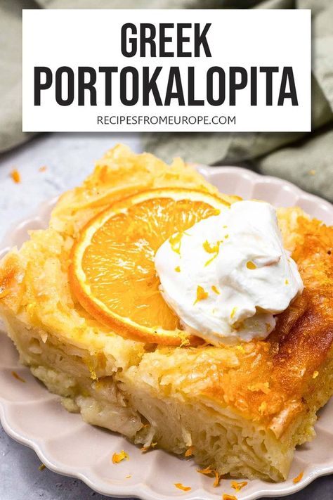 slice of portokalopita on plate with orange and whipped cream on top and text overlay "Greek Portokalopita". Orange Phyllo Cake, Broken Phyllo Cake With Orange And Bay, Greek Orange Pie, Portokalopita Recipe, Portokalopita Orange Cakes, Traditional Greek Orange Cake, Phyllo Cake From Crete, Greek Orange Phyllo Cake, Orange Syrup Cake