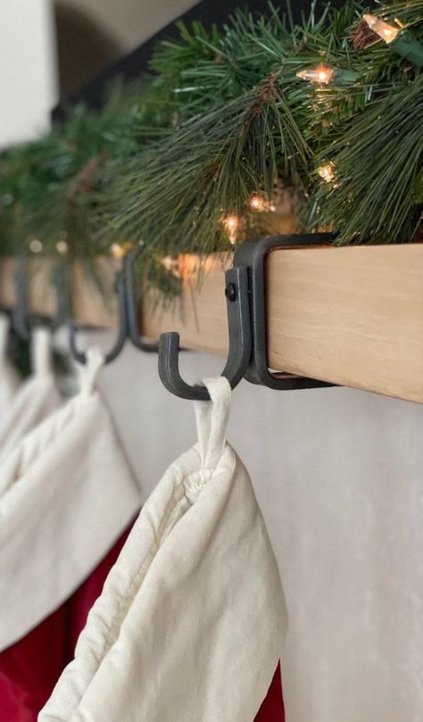 Perfect as a Christmas Stocking Holder, these Custom Mantel Hooks add Farmhouse charm to your Christmas Decor. KubieSteelCo is a local Peterborough business that makes shelf brackets, bench legs, saddle racks, gun racks and more! We are passionate about creating spaces you love to spend your time in. All of our steel is locally sourced and hand crafted ensuring the highest quality products. We help you achieve modern, farmhouse and industrial decor. Christmas Stocking Holders For Mantle, Christmas Stocking Hooks, Hanging Stockings On Mantel, Stocking Hangers Mantle, Hanging Stockings Without A Fireplace, Stocking Hooks Mantle, Stocking Holders For Mantle, Stocking Hangers, Stocking Hooks