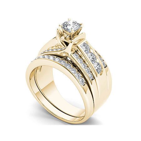 Breathtaking 1 1/4 ct. t.w. diamonds are the focus of a beautiful 14K yellow gold bridal ring set that make for a beautiful and lasting impression.Metal: 14K yellow goldStones: 1 1/4 ct. t.w. round diamondsColor: IClarity: I2-I3Setting: Prong, paveGallery Height: 7.39mmCare: Wipe CleanCountry of Origin: ImportedDiamond total weights may vary between .01 and .08 carat.Jewelry photos are enlarged to show detail. Disclaimer: Metal may be rhodium plated to enhance appearance and reduce tarnishing. Rose Gold Bridal Set, Jewelry Photos, Agate Engagement Ring, Yellow Gold Wedding Ring, Diamond Bridal Sets, Gold Wedding Ring, Bridal Ring Sets, Bridal Ring Set, Gold Wedding Rings