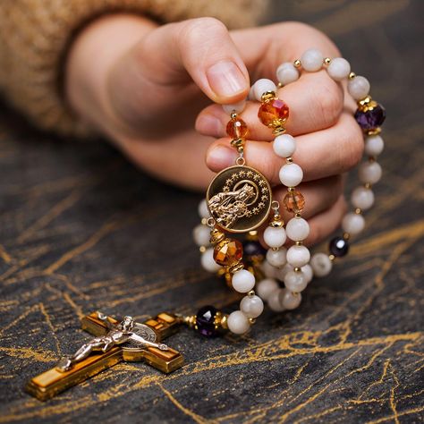 Theotokos CHARTRES rosary is made with stone, glass, metal and wood, just like the stunning cathedral its design was inspired by. Available at theotokosrosaries.com or click the link in our bio ⭐️ #theotokosrosaries #catholicrosary #rosarymaker #beautifulrosary #catholicmoms #catholicwife #catholicman #catholicfaith #catholicfamilylife #bridalgifts #catholicgifts #traditionalbeauty #tradcat #giftshop #luxurygifts Spiritual Crucifix Rosary As Gift, Spiritual Wedding Rosary With Crucifix, Bronze Rosary As Gift, Hand-strung Rosary As A Gift, Spiritual Hallmarked Crucifix Jewelry, Holy Rosary, Catholic Wedding, Rosary Catholic, Catholic Gifts