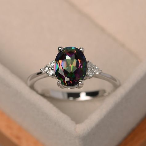 Mystic topaz ring rainbow topaz ring oval cut by LuoJewelry Rainbow Topaz Ring, Gold Diamond Wedding Rings, Rainbow Topaz, Mystic Topaz Ring, Gold Diamond Wedding Band, Aquamarine Engagement Ring, Silver Jewelry Design, Jewelry Bridal, Mystic Topaz