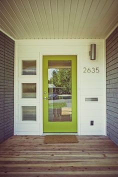 pinned for the exterior colors, but the interior is lovely, too Home Exterior Colors, Front Door Images, Colorful Doors, Mid Century Modern Exterior, Mid Century Exterior, Green Mid Century, Modern Entry, Wooden Front Doors, Casa Exterior