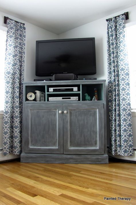 Build your own "Get Out of the Way of the TV" console. With cabinets for toys and books! Move TV to where leather chair is. Tall Corner Tv Stand, Media Console Diy, Build A Tv Stand, Corner Tv Console, Corner Entertainment Center, Tv Stand Plans, High Tv Stand, Tv Corner, Tall Tv Stands