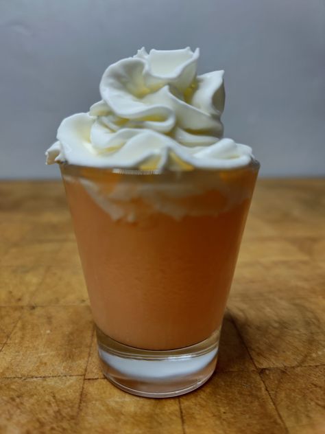 The orange creamsicle shot is a creamy, orange flavored shot that is super easy to make. This sweet shot is great dessert drink. Creamsicle Mimosa, Celebration Desserts, Whipped Cream Vodka, Brandy Cocktails, Orange Vodka, Fruit Cream, Cocktail Shots, Rum Cocktails, Vanilla Vodka