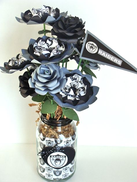 Oakland Raiders paper flower bouquet from 4bidn-city-bloomz Raiders Wedding, Raiders Gifts, Oakland City, Raiders Baby, Stock Flower, Paper Bouquet, Paper Flower Bouquet, 3d Flowers, Diy Homemade