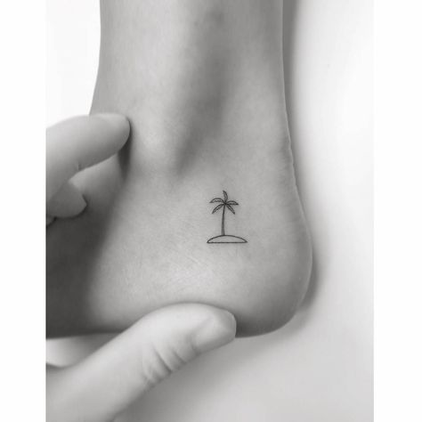 Minimalistic island and palm tree tattoo located on the Palm Tree Tattoo Ideas, Tree Line Tattoo, Palm Tree Tattoos, Back Of Ankle Tattoo, Palm Tree Tattoo Ankle, Tree Tattoo Ideas, Island Tattoo, Palm Tree Island, Tree Tattoos