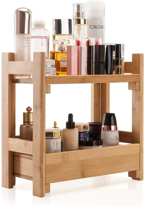 The Gobam Organizer Cosmetic Storage Holder ($46) has a natural-wood finish and can hold products on the top and bottom shelf. Bathroom Counter Organizer, Bathroom Countertop Organizer, Counter Organizer, Bathroom Counter Organization, Bamboo Makeup, Counter Organization, Perfume Organization, Organizer Shelf, Makeup Storage Box