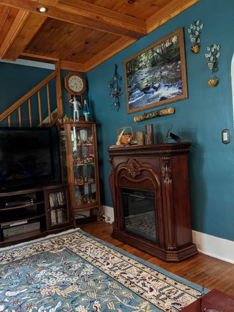 Cerulean Blue Living Room, Turquoise Living Room Walls, Blue And Maroon Living Room, Dark Teal Accent Wall Living Room, Male Living Room Decor, Dark Turquoise Living Room, Copper And Teal Interior Design, Tuscan Teal, Turquoise Brown Living Room