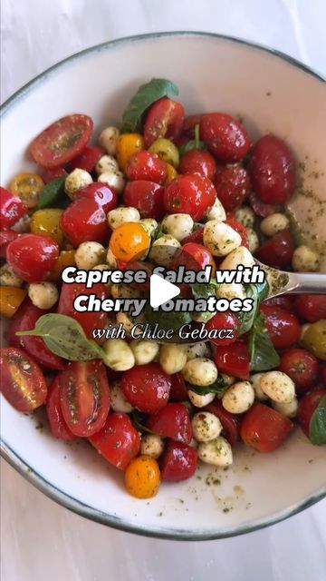 EatingWell on Instagram: "As long as we can still find those gorgeous tomatoes at the farmer’s market, we’ll keep the Caprese recipes coming. This one from @livdansky features a fresh basil dressing that perfectly complements sweet cherry tomatoes and creamy mozzarella.

Ingredients
- 1 cup packed fresh basil leaves, plus more for garnish
- ¼ cup extra-virgin olive oil
- 2 tablespoons balsamic vinegar
- ½ teaspoon salt
- ¼ teaspoon crushed red pepper
- 1 clove garlic
- 3 cups cherry tomatoes, halved
- 1 (8 ounce) container fresh mozzarella cheese pearls

Directions
1. Place basil, oil, vinegar, salt, crushed red pepper and garlic in a mini food processor or blender; process until combined, about 1 minute.
2. Combine tomatoes and mozzarella in a large bowl. Toss with the dressing and let st Mozzarella Pearls Recipes, Caprese Salad Dressing, Mini Food Processor, Tomatoes And Mozzarella, Mozzarella Pearls, Caprese Recipes, Basil Oil, The Farmer, Crushed Red Pepper