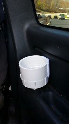 this is a simple cup holder for the back seat of your car. made easy in only a few minutes Diy Car Cup Holders, Cup Holder Ideas Cars, Cup Holder Diy, Cup Holder For Car, Diy Projects Using Pvc Pipe, Car Drink Holder, Car Knowledge, Diy Phone Stand, Truck Organization