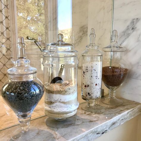 Organizer Tracy Bowers on Instagram: “From Bags to Beauty!  My smart 🤓client purchased these beautiful glass jars to display her bath salts. 🛁No more crinkled bags under the…” Bath Salts Storage Ideas, Bath Salt Organization, Bathroom Glass Jars, Bath Salt Container, Bath Salt Containers, Bath Salt Jars, Salt Storage, Shower Niche, Apothecary Bottles