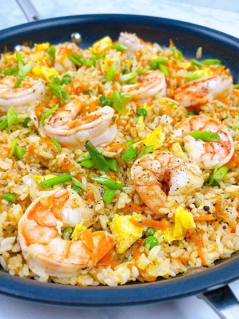 quick and easy shrimp fried rice better than takeout hero image. close up in frying pan with garnish. Shrimp Fried Rice Recipe Easy, Shrimp Fried Rice Easy, Fried Rice Shrimp, Easy Shrimp Fried Rice Recipe, Easy Shrimp Fried Rice, Rice With Beans, Shrimp Fried Rice Recipe, Shrimp And Rice Recipes, Fried Rice Recipe Easy