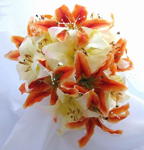 Tiger lily bouquet! This but with small pink/yellow flowers, and blue ribbon around the stems. Tiger Lily Bridal Bouquet, Lilly Centerpieces, Tiger Lily Bouquet, White Lily Bouquet, Tiger Lily Wedding, Meghan Wedding, Backyard Bbq Wedding, Lily Bouquets, Lily Bridal Bouquet