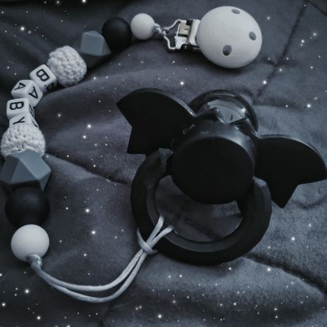 Goth Newborn Photography, Alt Baby Nursery, Emo Nursery Ideas, Nursery Ideas Goth, Pastel Goth Nursery, Spooky Nursery Ideas, Bat Themed Nursery, Goth Pacifier, Beetlejuice Nursery