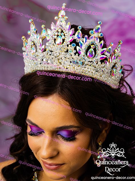 Shining Iridescent quinceañera Crown worn by a young woman during her Quinceañera celebration. Adorned with sparkling rainbow, tornasol jewels, the crown symbolizes the princess-like status of the celebrant on her special day. QUinceanera crown with AB jewels. It serves as a cherished accessory, highlighting the significance and elegance of the occasion. *Tiaras/Crowns cannot be engraved Color of Crown: IridescentIncludes: Crown only All the items are hand-made.Can be personalized with name and Rainbow Crown, Money Card Box, Quinceanera Crown, Bear Candle, Tiaras And Crowns, Candle Set, Young Woman, Quinceanera, The Crown