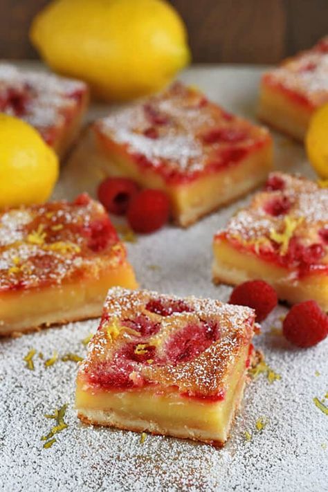 Luscious Raspberry Lemon Bars - Sweet, tangy and decadent recipe! The crisp crust delivers a delicious tangy raspberry lemon custard that is sure to stick to your fingers. | jessicagavin.com Yellow Raspberry Recipes, Raspberry Lemon Bars, Lemon Desert, Lemon Raspberry Bars, April Recipes, Everyday Cookies, Cottagecore Baking, Current Recipes, Raspberry Dessert