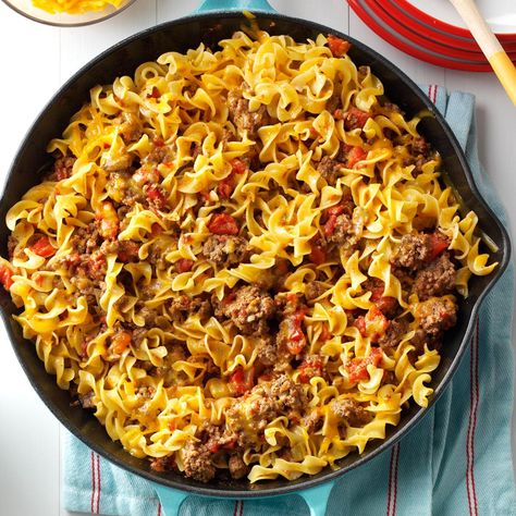 Chili Beef Noodle Skillet Recipe -A friend gave me this recipe. My husband likes this entree's hearty blend of beef, onion and tomatoes. I like it because I can get it to the table so quickly. —Deborah Elliott, Ridge Spring, South Carolina Beef Noodle Skillet, Spanish Noodles, Chili Beef, Iron Skillet Recipes, Skillet Recipes, Cast Iron Skillet Recipes, Onion Gravy, Cast Iron Recipes, Dinner With Ground Beef