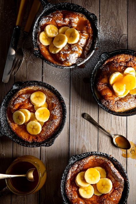 Dutch Baby Pancakes with Bananas and Rum Butterscotch ﻿Sauce - The Sweet Rebellion Pancakes With Banana, Peppermint Crisp Tart, Dutch Baby Pancakes, Biscuit Crust, Rum Sauce, Banana Rum, Peppermint Crisp, Crepe Suzette, Dutch Babies