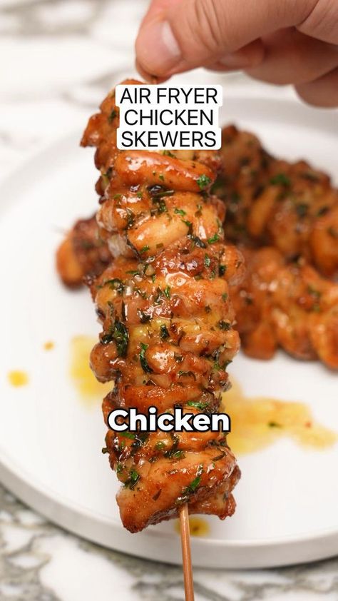 These Air Fryer Chicken Skewers came out so juicy and are a perfect quick weeknight meal! They’re delicately marinated in a blend of delicious spices and then generously brushed with a garlic herb butter that is incredible! The best part? They’re quick and easy and clean up is a breeze - done in less than 45 minutes! #cjeatsrecipes #easyrecipes #airfryer #chicken #skewers Garlic Butter Chicken Skewers, Air Fryer Chicken Skewers, Garlic Parmesan Air Fried Chicken Skewers, Lemon Chicken Skewers Air Fryer, Air Fried Garlic Parmesan Chicken Skewers, Chicken Skewers Air Fryer, Lemon Garlic Chicken Skewers, Air Fried Garlic Parm Chicken Skewers, Airfryer Lemon Pepper Chicken Skewers