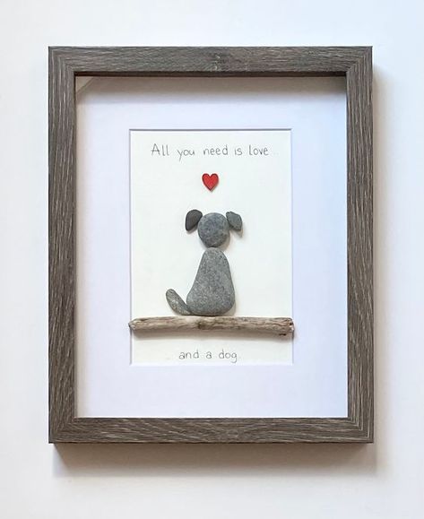 Cute Pebble Art, Seashell Dog Art, Dog Pebble Art, Rock Art Ideas River Stones Diy Projects, Pebble Art Ideas Inspiration, Pebble Art Dogs, Framed Shells, Diy Pet Crafts, Rock Scripture