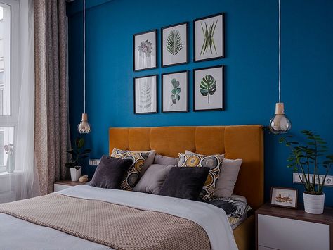 Fabulous blue accent walls in the modern bedroom with framed botanical to highlight it further [From: Flatsdesign] Bright Blue Accent Wall Bedroom, Bright Blue Bedroom, Add Bedroom, Industrial Modern Bedroom, Blue Bedroom Walls, Fabulous 50, Blue Accent Walls, Tropical Bedrooms, Accent Wall Bedroom