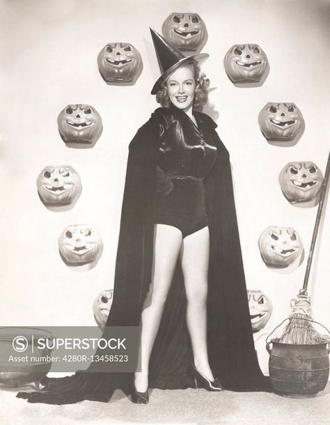 Superstock offers millions of photos, videos, and stock assets to creatives around the world. This image of Woman in witch costume surrounded by carved pumpkins by Old Visuals/Everett Collection,Old Visuals is available for licensing today.