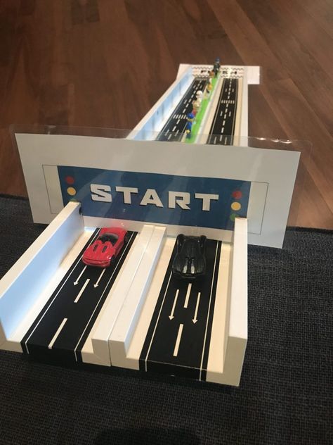 The is the easiest DIY toy car ramp ever! This homemade car ramp will keep your little ones entertained for hours! DIY hot wheels track for toy car racing! #diy #diyramp #diykids #easydiy #toycarramp #kidsracetrack #toycarracing #carrampsfortoddlers #toddlerracetrack Diy Road For Toy Cars, Diy Hot Wheels Track, Ikea Picture Shelves, Diy Car Ramps, Kids Race Track, Diy Toy Car, Diy Toys Car, Car Ramp, Ikea Pictures