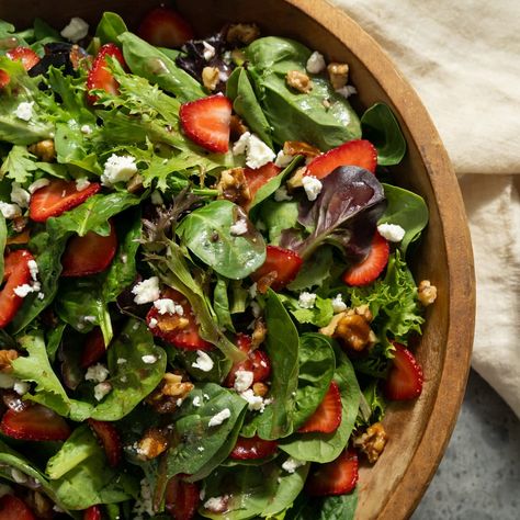 Mixed Greens Salad with Strawberries and Candied Walnuts Recipe - Magnolia Joanna Gaines Blush Wine Vinegrette, Joanna Gaines Strawberry Salad, Joanna Gaines Strawberry Vinaigrette, Candied Walnuts Recipe, Candied Walnuts For Salad, Strawberry Walnut Salad, Magnolia Recipes, Table Meals, Magnolia Table Recipes