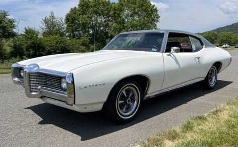 Not a GTO, but this 1969 Pontiac LeMans doesn't need to be - it's a fabulous survivor and equipped right! Suddenly it's 1969 again! 1969 Pontiac Lemans, Cars Chevrolet, Pontiac Tempest, Pontiac Lemans, Vintage Muscle Cars, Car Chevrolet, Buick Skylark, Vintage Muscle, American Classic Cars