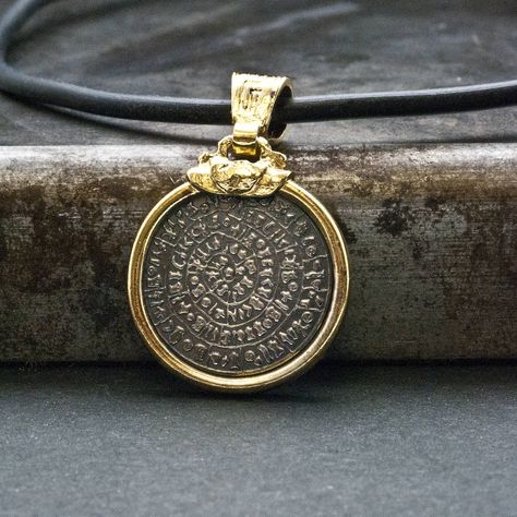 Phaistos Disc Greek Necklace, Unisex Gold and Sterling Pendant, Ancient Minoan Cretan Necklace, Greek Mystery, Men Necklace, Greek Jewelry https://etsy.me/2ONaCiY #jewelry #necklace #gold #silver #unisexadults #greeknecklace #silverphaistosdisc #wearableart #greekpenda Sauna Inspiration, Mystery Men, Ancient Minoan, Silver Coin Jewelry, Phaistos Disc, Greek Necklace, Coin Frame, Coin Jewellery, Ancient Coin Jewelry