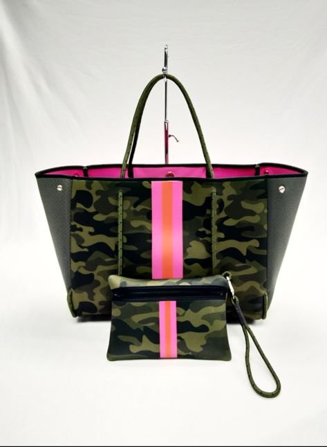 Dimensions- 18 wide (side panels expanded) x 12 inches tall x 10 inches deep Green Camo/pink and orange stripe This neoprene tote is the perfect blend of style and functionality. Ultra light weight Side panels expand for a phantom shape or snap in for a streamline look Removable hard bottom liner Removable wristlet pouch Washable with mild soap. Hang dry. For coated editions hand wash recommended. Pouch measures 8.5 inches wide by 6 inches tall Chug Dog, Pink Starburst, Neoprene Bag, Wristlet Pouch, Pink Snake, Camo And Pink, Neoprene Tote, Striped Bags, Blue Camo