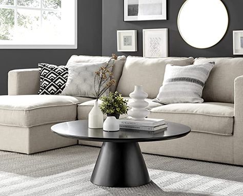 Upgrade your living room ambiance with this circular coffee table that makes a bold statement due to its large size. The piece has an industrial black finish that's both minimalist and sophisticated, keeping up with the latest trends. This trendy piece is guaranteed to impress your visitors and add a touch of elegance to your space. Assembling it is a breeze, and the instructions are straightforward, making it quick and simple to set up. Concrete Living Room, Round Black Coffee Table, Living Room Center, Furniture Box, Pedestal Coffee Table, Elegant Coffee Table, Coffee Table Centerpieces, Black Coffee Tables, Contemporary Coffee Table