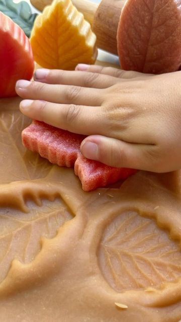 Charlotte Parry | Lottie Makes Social on Instagram: "Following on from earlier when we discovered the wonderful prints in Playdough from a pinecone, I added the beautiful leaves to explore the Autumn colours and the prints in Playdough - aren’t the prints wonderful?🍁🍃🍂

Leaves from @yellow_door_education 
Dough from @curiositycornersensorydough 

#playdough #leaves #autumn #play #playtime #outdoorplay #eyfs #homelearning #nature #hyggeintheearlyyears #curiousdough #dough #playdoughplayactivities #playbasedlearning #playdoughfun" Dough Aesthetic, Playdough Activities, Yellow Door, Playbased Learning, Beautiful Leaves, Yellow Doors, Leaves Autumn, Autumn Colours, Play Dough