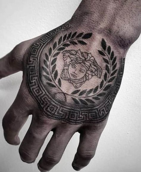 Medusa Tattoos: What Do They Symbolize? (With Images) Versace Tattoo, Tattoo Main, Herren Hand Tattoos, Medusa Tattoo Design, Flower Tattoo Shoulder, Neck Tattoo For Guys, Incredible Tattoos, Medusa Tattoo, Hand Tattoos For Women