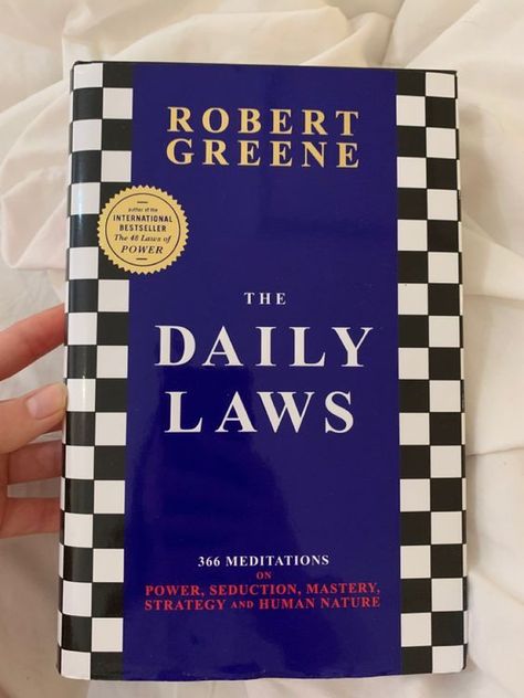 The Daily Laws by Robert Greene, must read book. meditation Daily Laws, Robert Greene Books, The 48 Laws Of Power, Laws Of Power, Metaphysical Books, Books By Black Authors, Empowering Books, 48 Laws Of Power, Budapest Travel