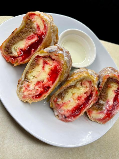 Strawberry Cheesecake Egg Rolls Recipe, Strawberry Cheesecake Egg Rolls, Cheesecake Egg Rolls, Breakfast Cheese Danish, Food Feast, Breakfast Cheese, Egg Roll Wrappers, Egg Roll Recipes, Coconut Pecan