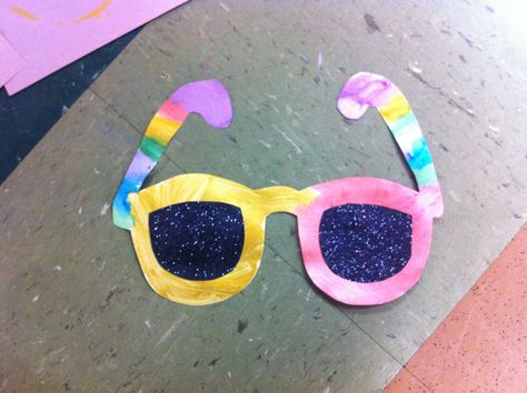 Summer sunglasses craft with black glitter lenses for preschoolers Sunglasses Craft Preschool, Sunglasses Crafts For Toddlers, Sunglasses Craft, Make Sunglasses Craft, Yellow Sunglasses For Summer Outdoor Activities, Making Sunglasses Craft, Summer Sunglasses Craft, Diy Sunglasses, Summer Preschool Crafts