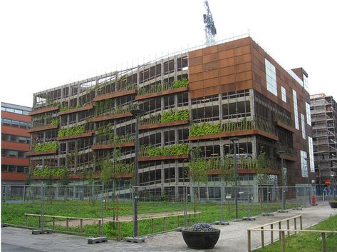 Malmo car park Parking Structure Design, Parking Building Facade, Parking Building Design, Parking Garage Architecture, Green Parking, Parking Lot Architecture, Parking Structure, Malmo Sweden, Garage Pictures