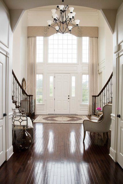 17 Fabulous Transitional Entry Hall Designs For The Perfect Welcome Two Story Foyer Decor, Wall Thoughts, Foyer Window, Thoughts Design, Arched Window Treatments, Transitional Entry, Design Entrance, Entrance Wall, Interesting Thoughts