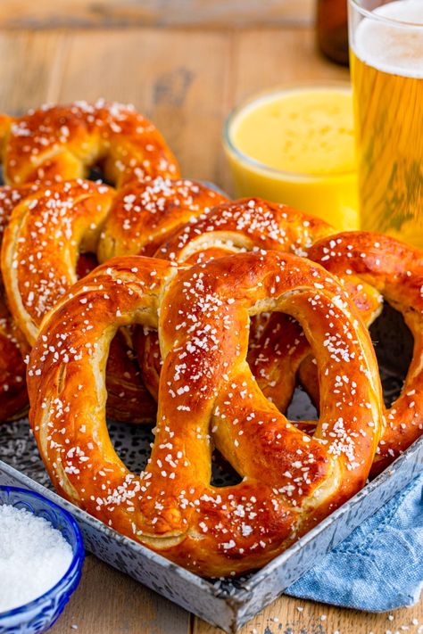 Soft, chewy and full of salt, these Homemade Soft Pretzels are delicious and the perfect appetizer or snack recipe that you will not be able to resist. Roasted Garlic Cream Cheese, Garlic Cream Cheese, Soft Pretzel Recipe, Pretzel Cheese, Pretzel Shape, Cream Cheese Dip, Baking Soda Bath, Salted Pretzel, Beer Cheese Dip