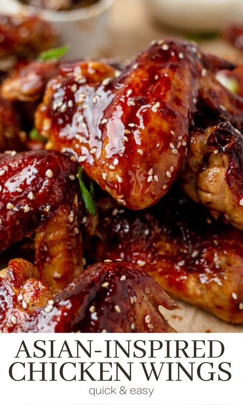 These Asian chicken wings are crispy and sticky thanks to a secret (but simple) ingredient and sweet and (slightly) spicy sauce. They make a delicious addition to any game day spread but are easy enough to enjoy for dinner with a side of veggies. Mongolian Chicken Wings, Sticky Chinese Chicken Wings, Sticky Sauce For Wings, Sweet And Sticky Chicken Wings, Sweet And Spicy Asian Sauce, Asian Wing Sauce Recipes, Chicken Wings Asian Style, Asian Chicken Wings Recipe, Asian Chicken Wing Recipes