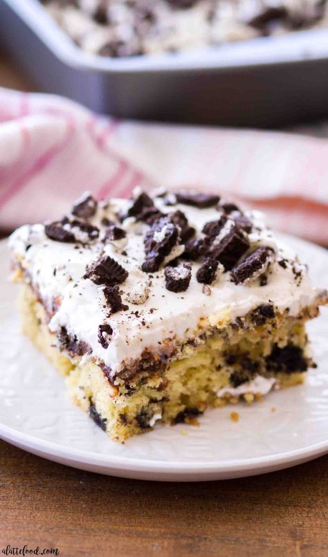 This easy Oreo Cookies and Cream Poke Cake recipe is made with boxed cake mix (yellow or vanilla/white) and is filled with chocolate pudding and topped with whipped cream cheese frosting. This uses a homemade whipped cream (instead of making it with cool whip), making it the ultimate dessert. #chocolate #oreo #cake #cookiesandcream #dessert #recipe Cookies And Cream Poke Cake, Oreo Poke Cake Recipe, Oreo Poke Cake, Cream Poke Cake, Cookies And Cream Frosting, Poke Cake Recipe, Cookies And Cream Cake, White Cake Recipe, Poke Cake Recipes