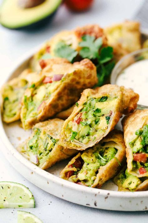 Avocado Egg Rolls Cheesecake Factory, Avocado Egg Recipes, Cheesecake Factory Copycat, Avocado Egg Rolls, Salmon With Avocado Salsa, Deep Fried Appetizers, Egg Wrap, Wrap Recipe, The Recipe Critic