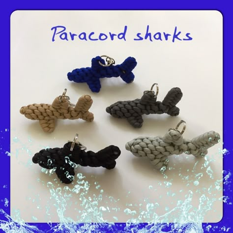 My new paracord sharks. I learned how to make the paracord dolphin from watching a video on YouTube, and modified it to look more like a shark. Shark Macrame, Paracord Animals Tutorials, Paracord Animals, Paracord Projects Tutorials, Parachute Cord Crafts, Macrame Animals, Cord Crafts, Paracord Projects Diy, Paracord Bracelet Patterns