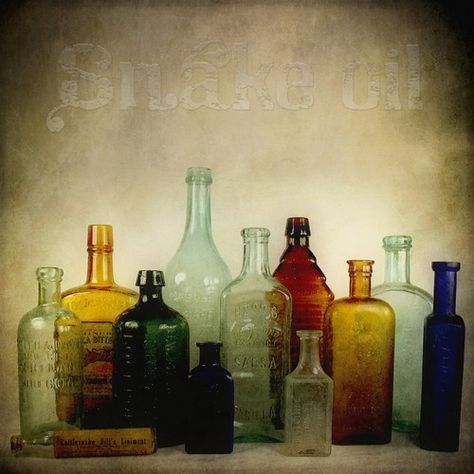 multi Glass Bottles Photography, Bottles Photography, Witch Balls, Snake Oil, Simple Photography, Bottle Trees, Old Glass Bottles, Jar Art, Rainbow Glass